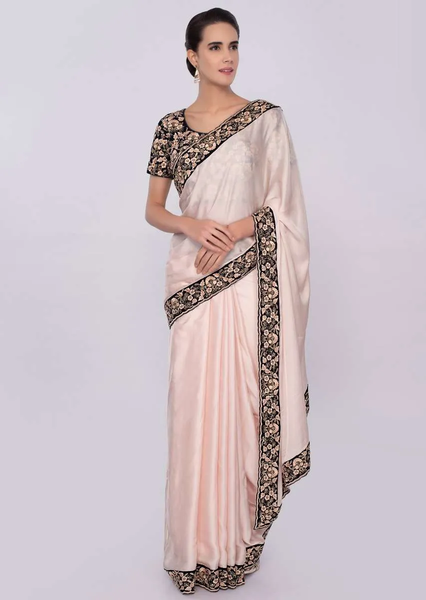 Creamish peach satin silk saree with dark navy blue velvet blouse only on Kalki