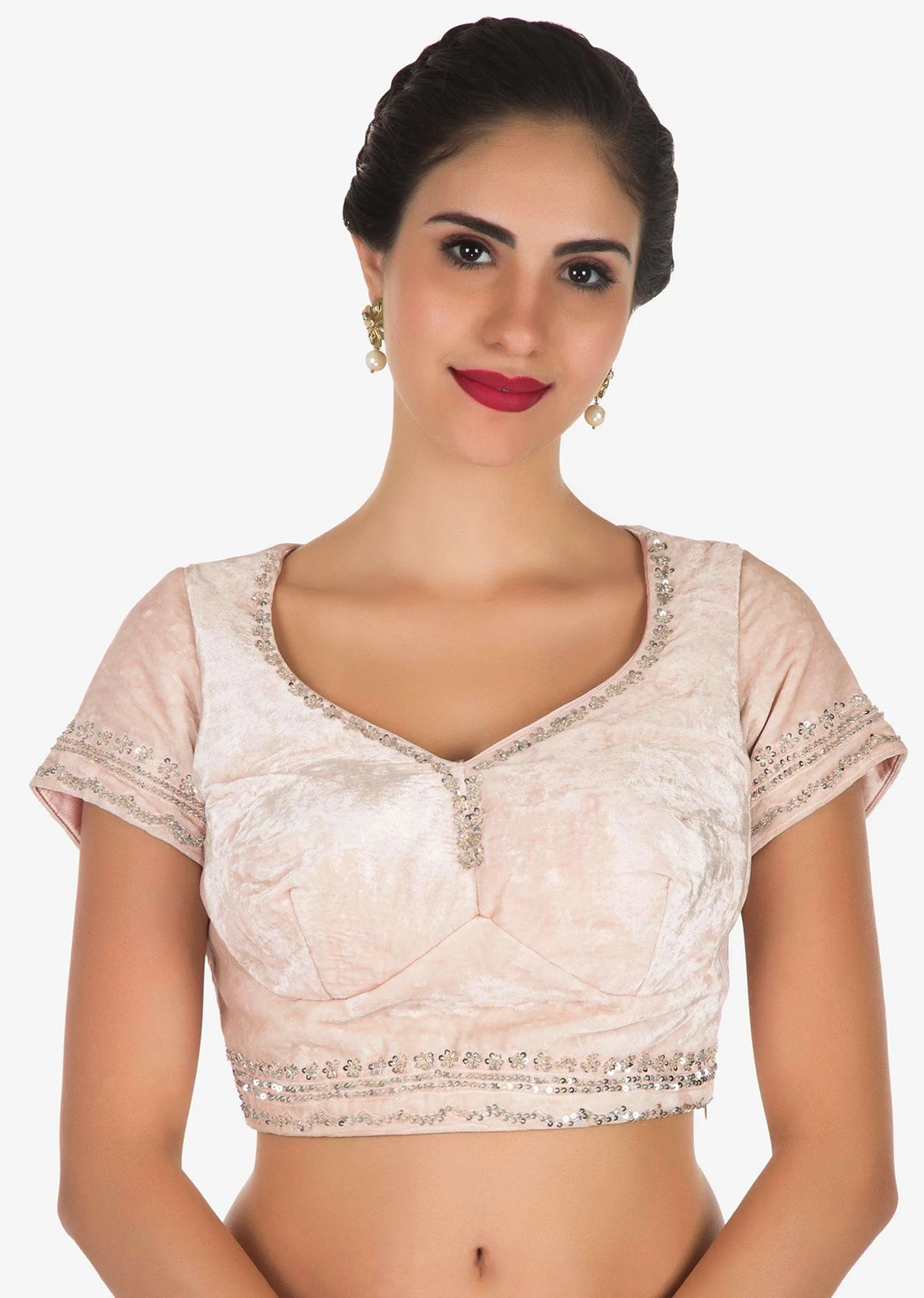 Pastel hued saree in net with velvet blouse adorn in heavy sequin and thread embroidered work only on Kalki